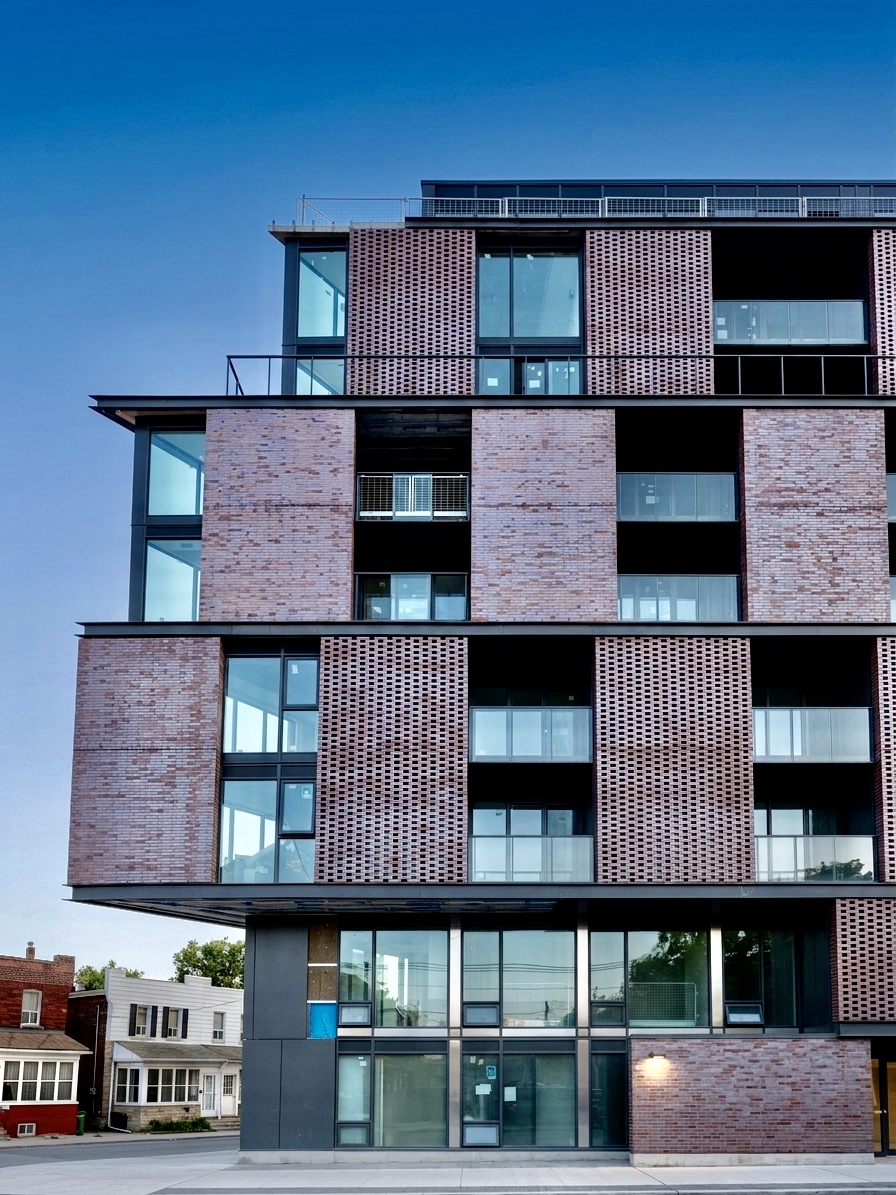 Downtown Toronto Residence — ACM rainscreen · custom brick cladding · glass balcony systems